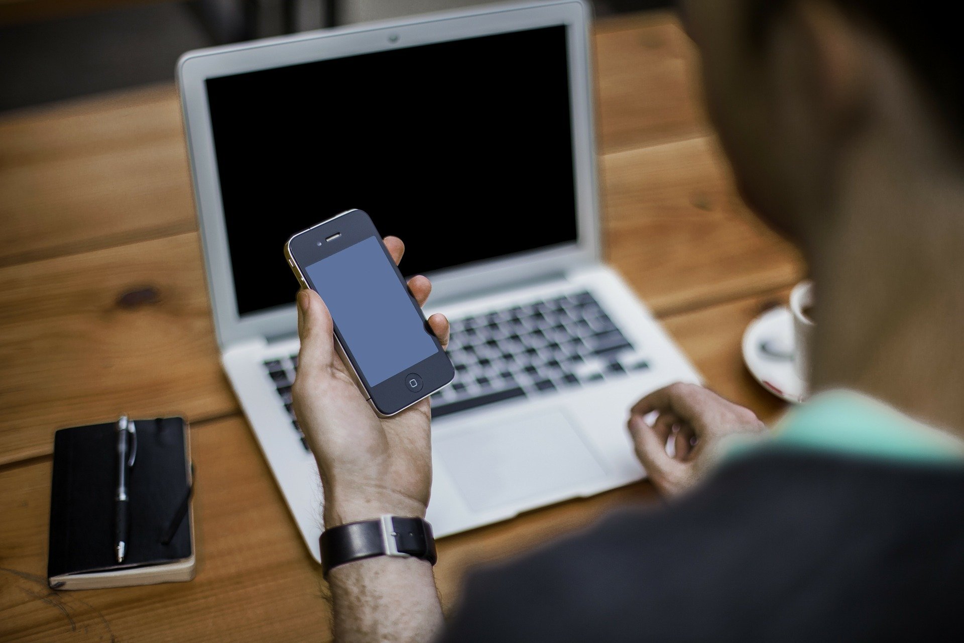 man watching at his phone