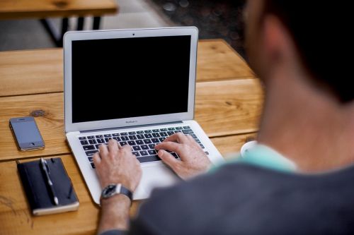 Man using a mackbook air