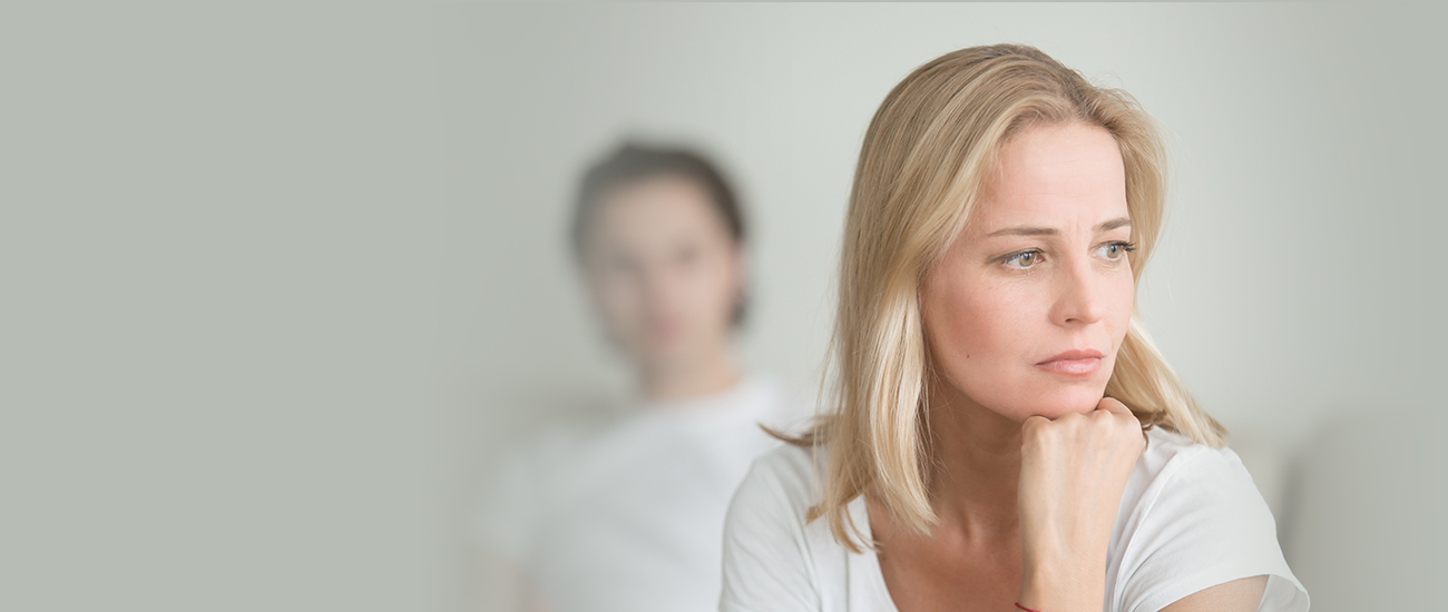 A woman with blonde hair looking directly at the camera.